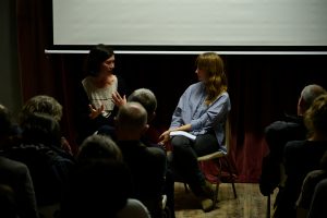 Artist speaking with curator Laura Smith