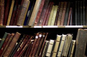 Old books on two shelves